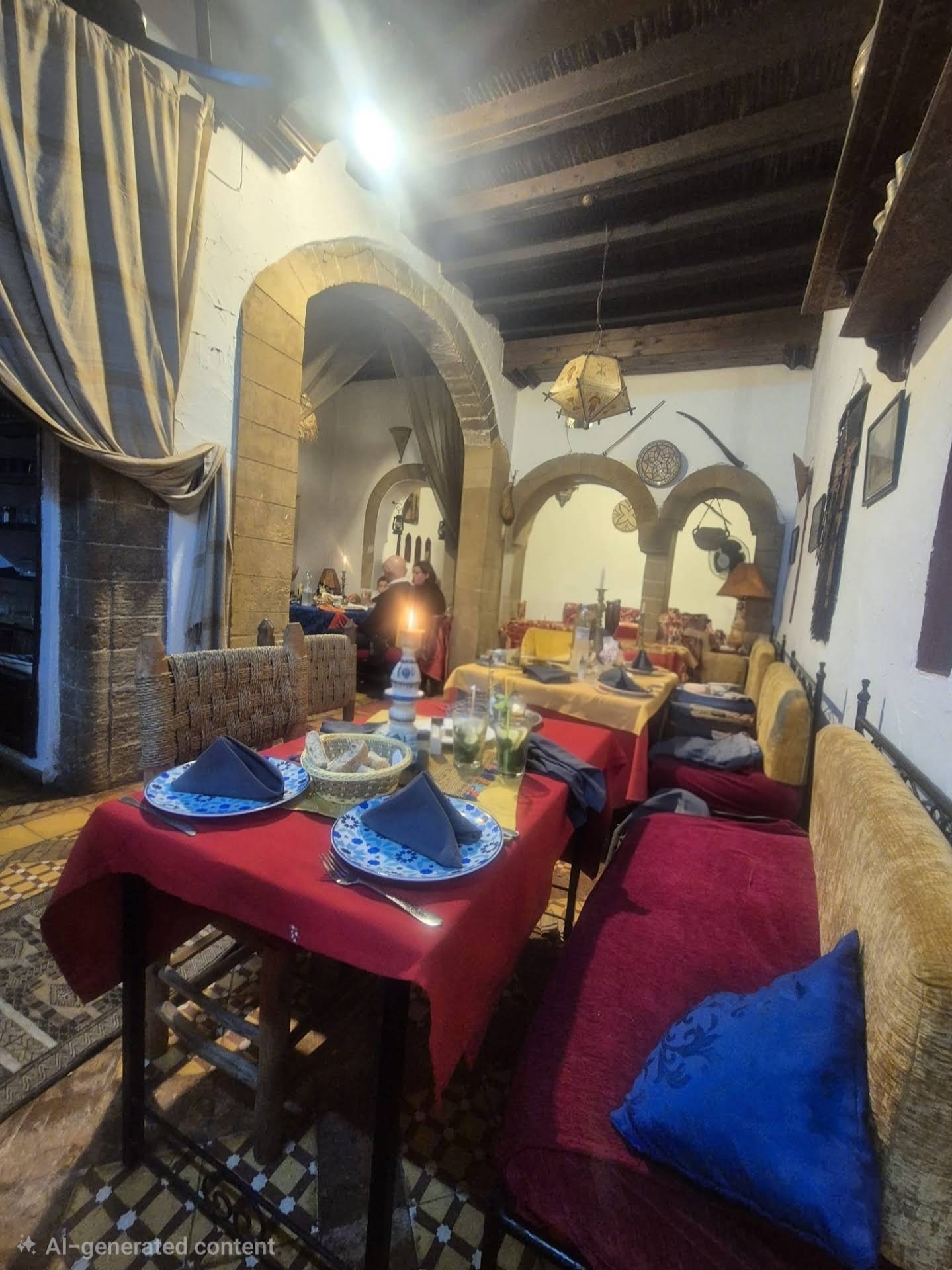 Dining room glowing with candlelight at dusk